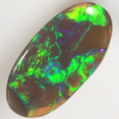 SOLID BLACK CRYSTAL OPAL Rolling flashes of golden green